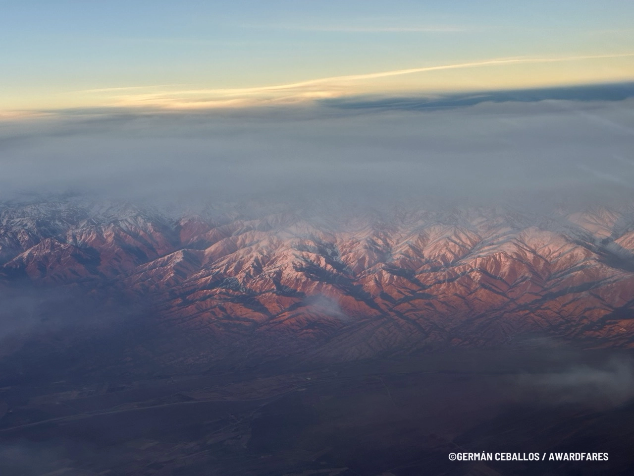Flying over the rugged terrain of the Andes during final approach.